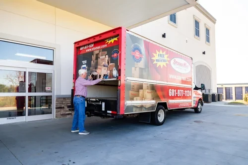 man closing truck door